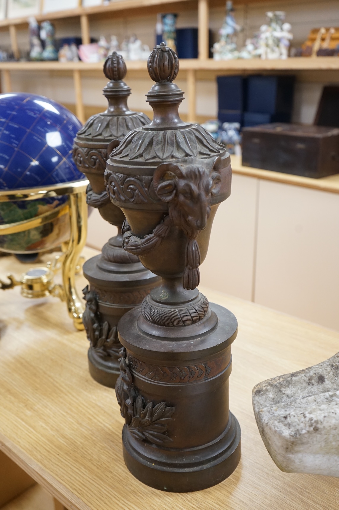 A pair of Grand Tour style bronze rams' head vases, H 55cm W 18cm